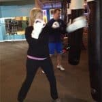 woman boxing heavybag drills